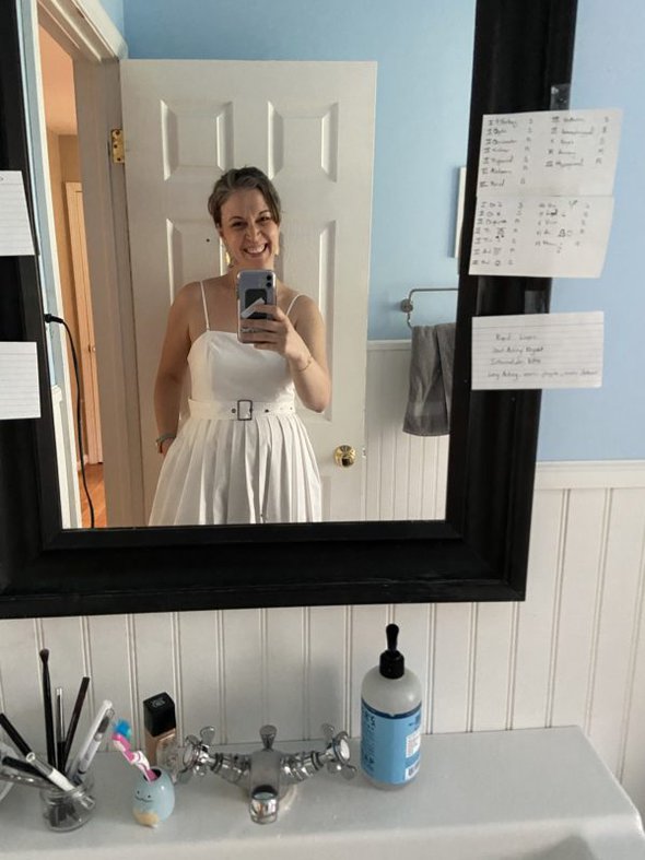 Kristen in white dress.
