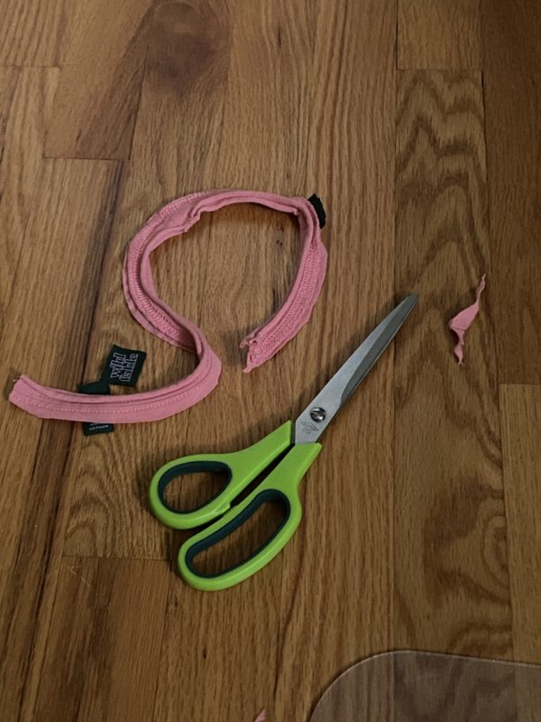 scissors on a wood floor.
