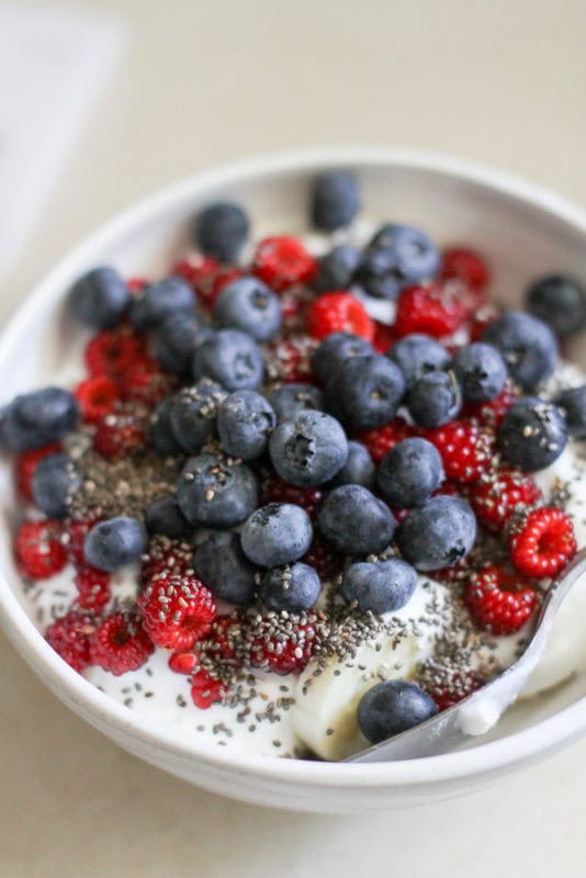 berries and chia seeds on yogurt.